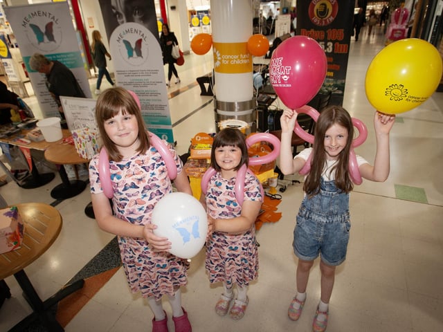 Enjoying the Lisnagelvin Shopping Centre's Annual Great Family Fun Day are Paris-Rose Maitland (11), Alexis Maitland (7) and Kayla Strain (8).