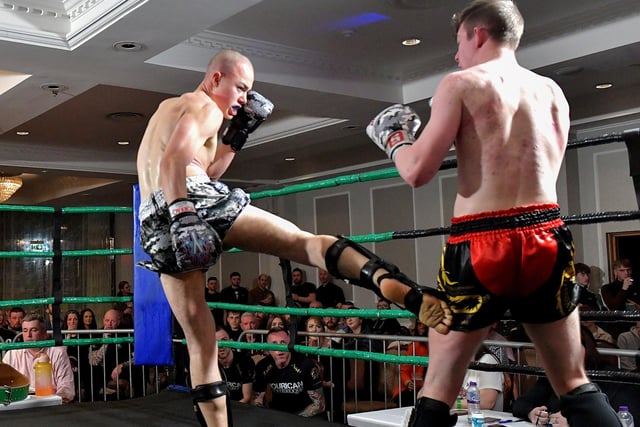 Rathmor Warriors’ Dylan Anderson (left) defeated Hourican KB’s Josh King in a K1 bout on Saturday evening last in the Everglades Hotel. Photo: George Sweeney.  DER2312GS – 74