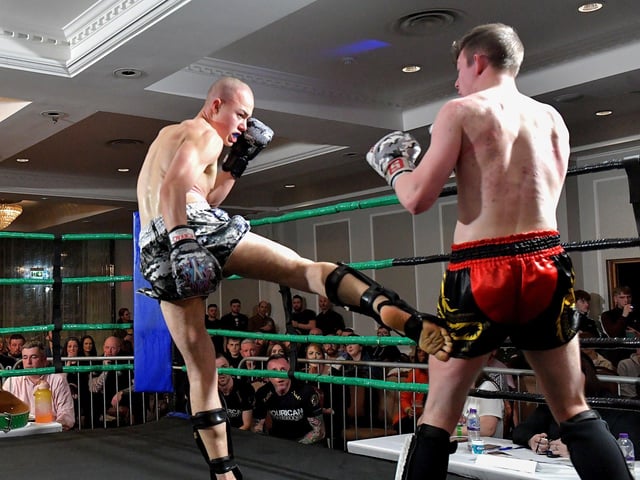 Rathmor Warriors’ Dylan Anderson (left) defeated Hourican KB’s Josh King in a K1 bout on Saturday evening last in the Everglades Hotel. Photo: George Sweeney.  DER2312GS – 74