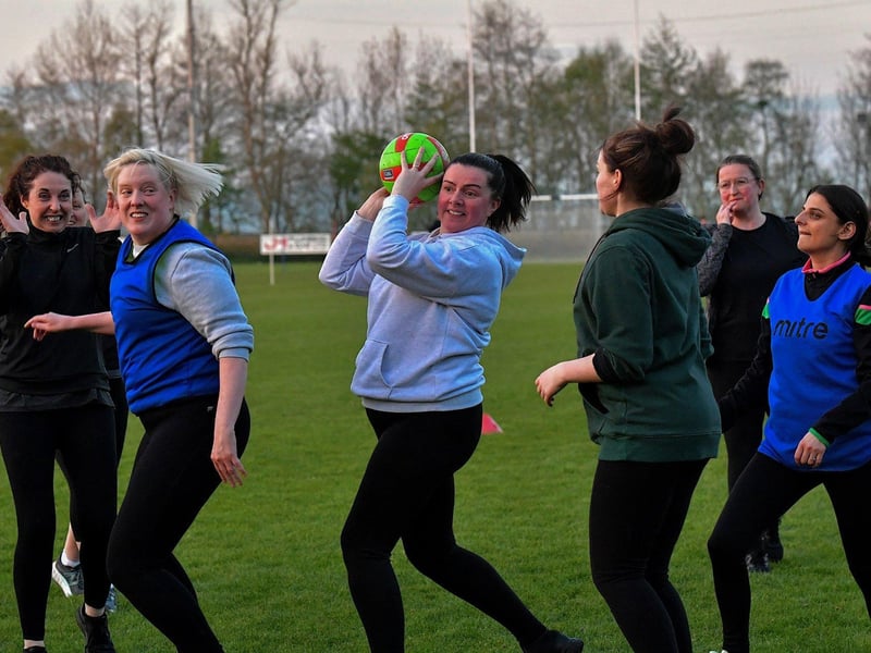 April 2023: Action from Doire Trasna’s first 'Mothers and Others' football practice session at Corrody Road. Photo: George Sweeney.  DER2316GS