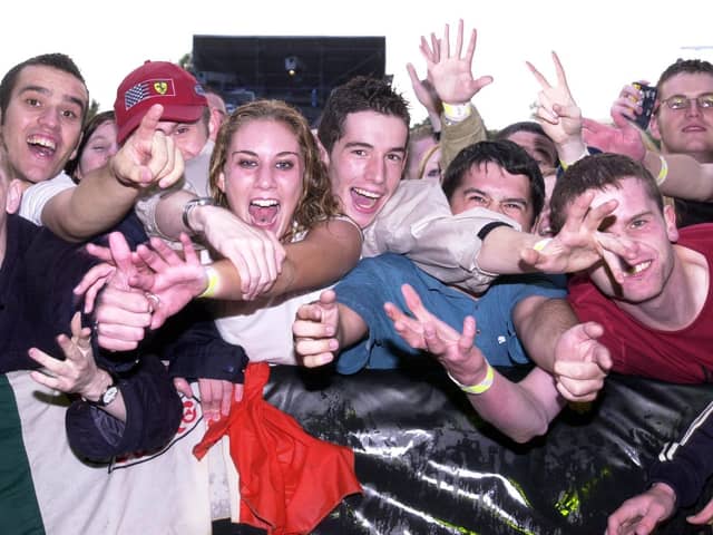 Mad for it! Fans enjoying the Oasis and Ocean Colour Scene concert in September 2002.