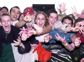 Mad for it! Fans enjoying the Oasis and Ocean Colour Scene concert in September 2002.