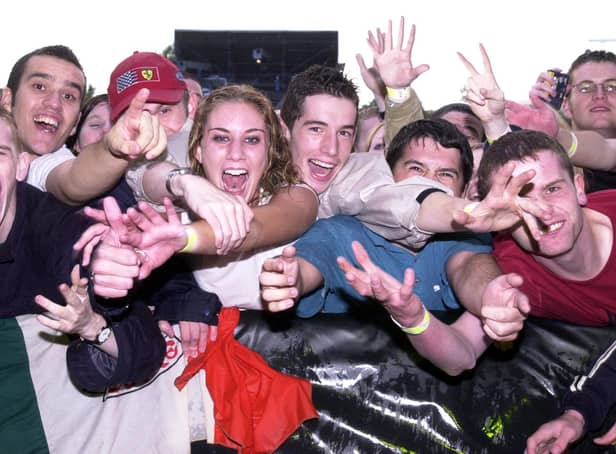 Mad for it! Fans enjoying the Oasis and Ocean Colour Scene concert in September 2002.
