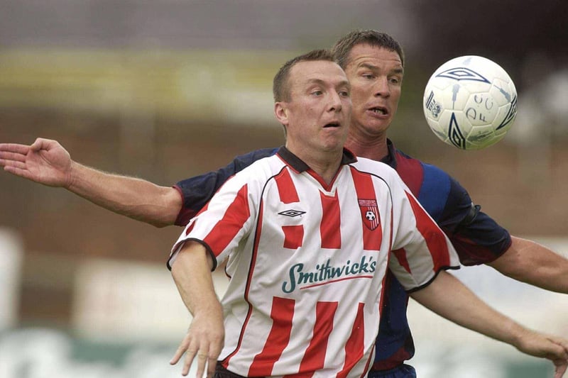 Liam Coyle is challenged by Patrick Andersson