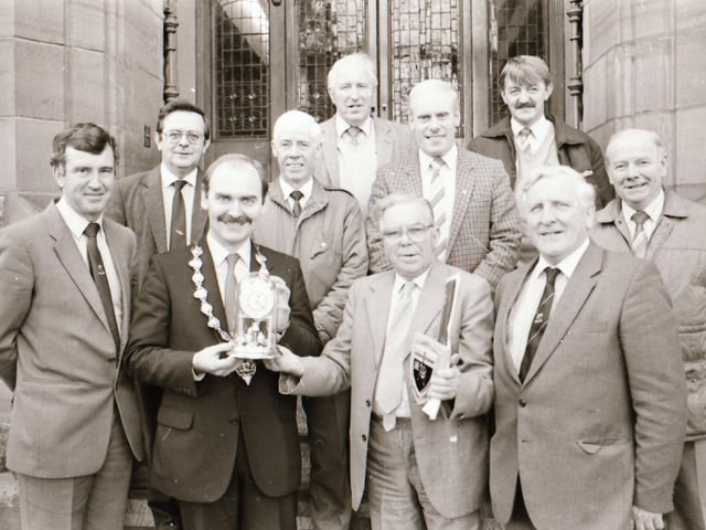 Presentation to Eddie Semple of City Council staff at the Guildhall.