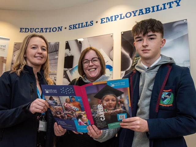 Ethan Concannon and Joanne Concannon get a tour of the facilities from Maria Moore at Open day at Strand Road campus.
