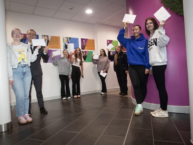HIGH ACHIEVERS. . . .Mr. Brendan McGinn, Principal, St. Mary's College pictured with some of the school's high A Level achievers on Thursday morning. From left, Kate Clarke, Caitlin Morrison, Rachel Doherty, Alix Lyttle, Zara O'Reilly, Niamh Bowen and Jessica Helferty (Photos: JIm McCafferty Photography)