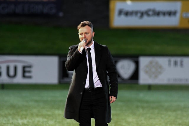 Conor McGinty’s rendition of Amhrán na bhFiann, at the Presidents Cup final, drew rapturous applause from the attendance at Brandywell on Friday evening. Photo: George Sweeney. DER2307GS – 101