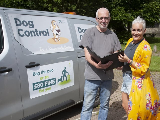 Hurt’s ‘Paws for Thought’ Doggy Walk organiser Leeann Doherty in conversation with Derry City and Strabane District Council’s dog warden Kieran Graham (Dog Control) at Saturday’ event.