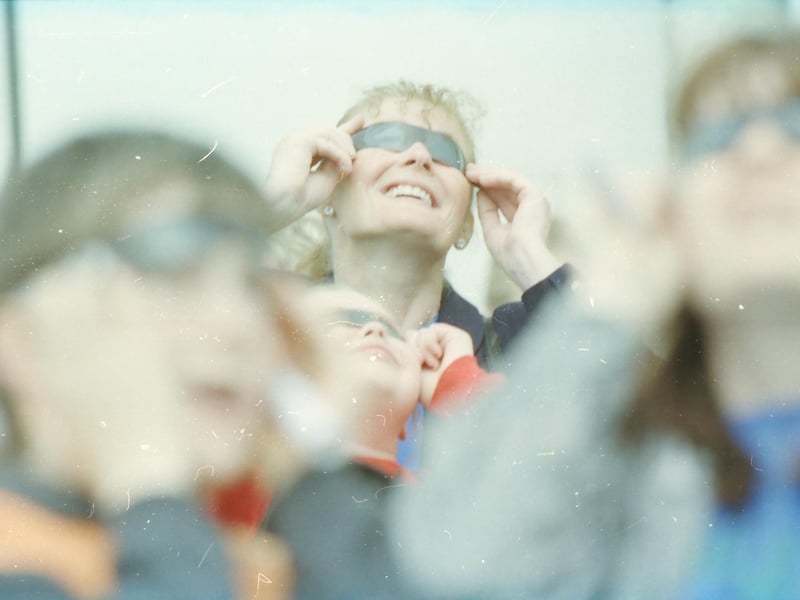 Sun-gazers view the eclipse of the sun at Greencastle.