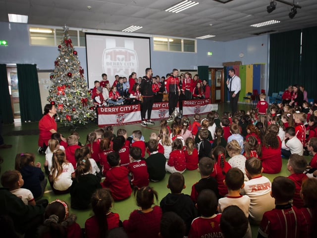 Mr. Sean McLaughlin, Principal, Greenhaw PS, welcomes the two Derry City players to the school on Monday among a full assembly. (Photos: Jim McCafferty Photography)