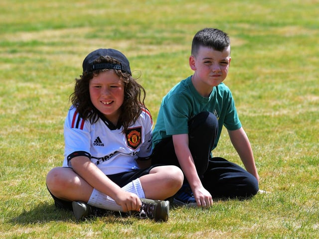 Pupils enjoy the sunny weather at the Holy Child Primary School sports day held on Monday last. Photo: George Sweeney. DER2325GS – 016