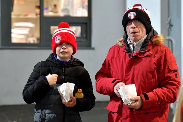 Derry City fans enjoying some chips at Derry City’s game against Cork City. Photo: George Sweeney. DER2308GS – 135