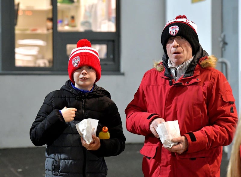 Derry City fans enjoying some chips at Derry City’s game against Cork City. Photo: George Sweeney. DER2308GS – 135