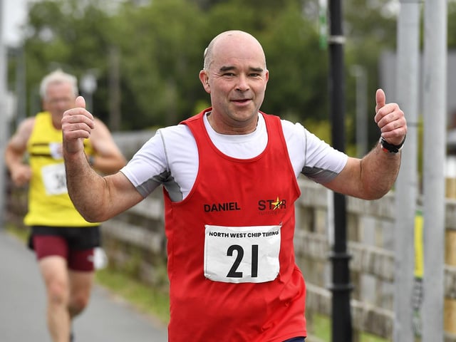 Competitor runs in the Muff Feile 5km race on Saturday morning. Photo: George Sweeney