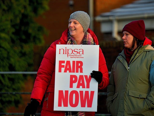 Health and social care workers seeking better pay and conditions take part in industrial action at Altnagelvin Hospital on Monday morning. Photo: George Sweeney. DER2250GS – 05
