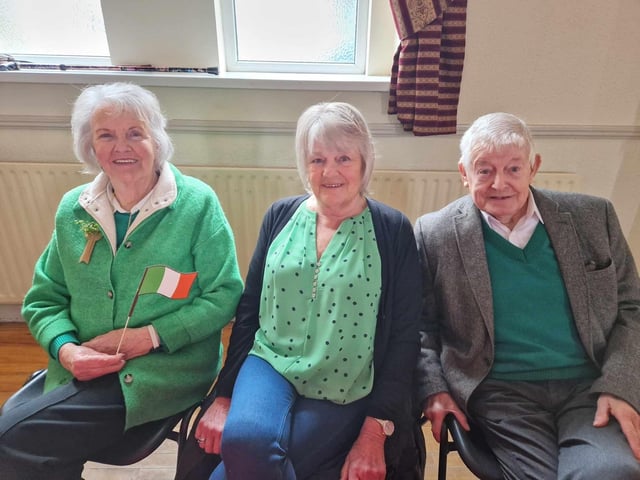 Kathleen Martin, Jan Hegarty and Owen McDaid enjoying teas and tunes in St Mary's Hall ahead of the Buncrana St Patrick's Day Parade 2025.