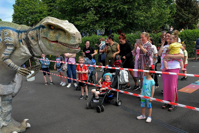 The Tyrannosaurus was a popular visitor the Long Tower Primary School Family Fun day on Friday afternoon. Photo: George Sweeney. DER2322GS – 110