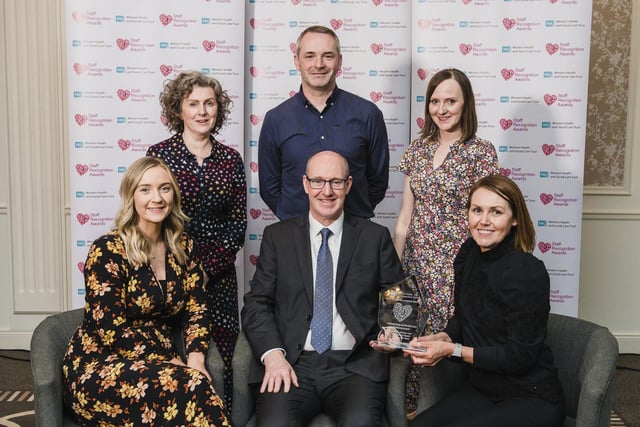 Championing Our Health and Wellbeing Award Winner is Dr Mary Dooher and the Clinical Health Psychology Team, (Trustwide) pictured with Neil Guckian, Chief Executive, Western Trust.