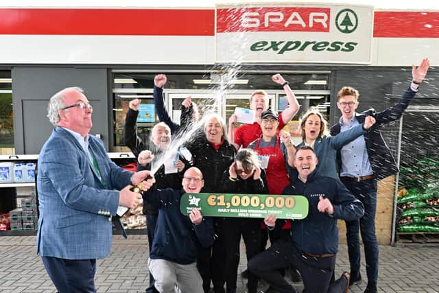 . Staff at Kiernan’s, Tullygay, Letterkenny, Co. Donegal Celebrating after selling a National Lottery €1,000,000 Daily millions winning ticket. Pictured are Pauric Gillespie, Field Sales Representative, National Lottery, Liam O'Brien, Paul Harkin, Barry Daly, Liz Gallagher, Niamh Sheridan Alex O'Fearraigh, Pauric McGarvey, Mary Black, Gareth Neely, Daragh O'Dwyer, National Lottery Spokesperson. Photo Clive Wasson / Mac Innes Photography