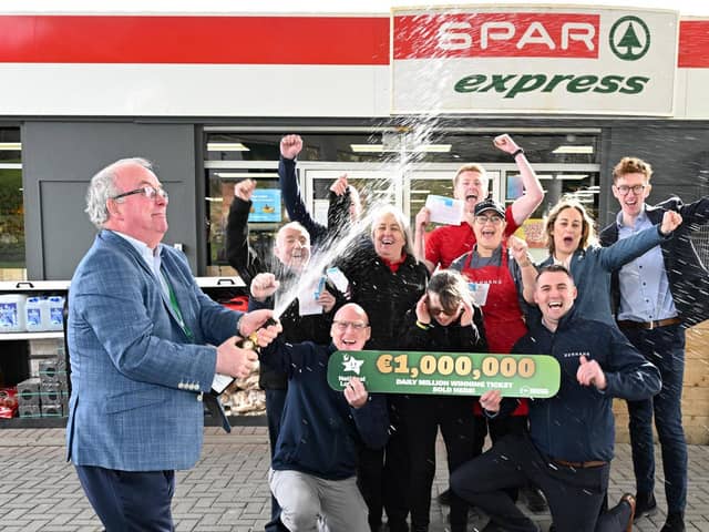 . Staff at Kiernan’s, Tullygay, Letterkenny, Co. Donegal Celebrating after selling a National Lottery €1,000,000 Daily millions winning ticket. Pictured are Pauric Gillespie, Field Sales Representative, National Lottery, Liam O'Brien, Paul Harkin, Barry Daly, Liz Gallagher, Niamh Sheridan Alex O'Fearraigh, Pauric McGarvey, Mary Black, Gareth Neely, Daragh O'Dwyer, National Lottery Spokesperson. Photo Clive Wasson / Mac Innes Photography
