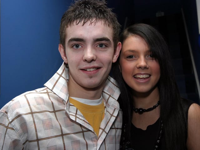 Boyfriend Connor poses for a photograph with birthday girl Nicole. 0053/JML