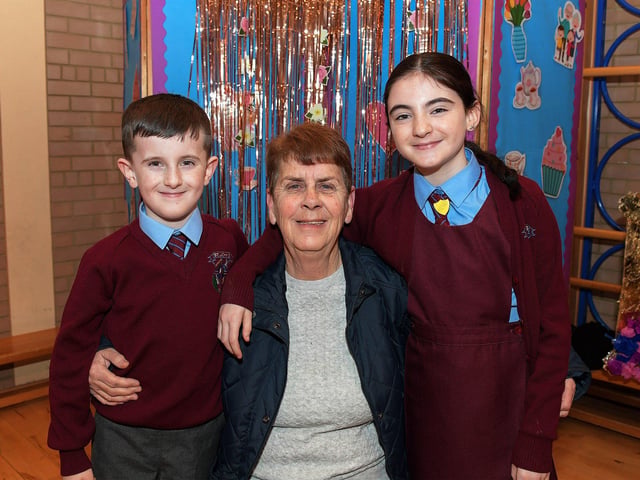 Jean Rodgers with Daithi and Aoibh at St John’s PS Grandparents Vintage Tea. Photo: George Sweeney