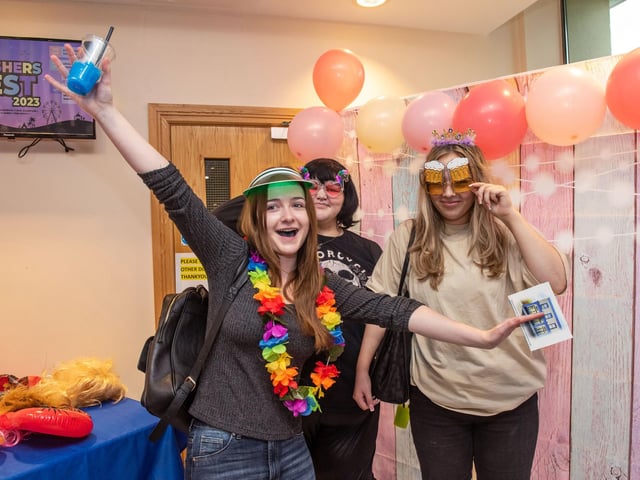 Early Years students Nicole Donnelly, Sarah Blonney and Caoimhe Craig try out the photo booth at NWRC's Freshers' Fest at Strand Road campus. 