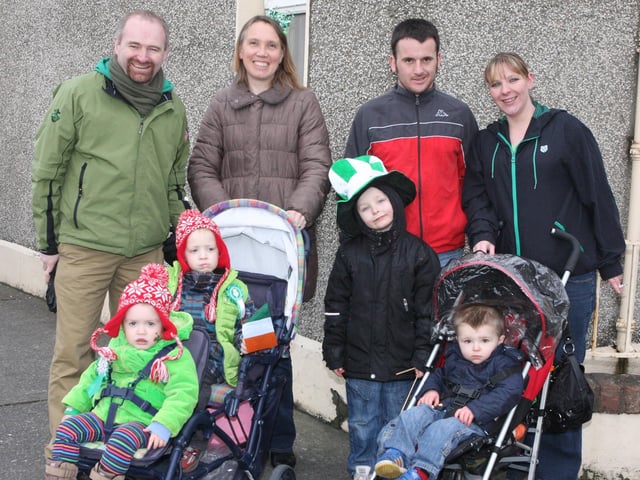 The Millar and Ward families await the arrival of the floats during Sunday's festivities in Buncrana. 1903Jm24
