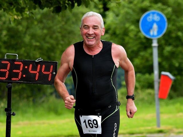 Terence Quinn finishes the Liam Ball Triathlon on Sunday morning.