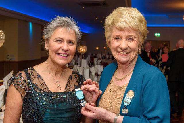 Kate Porter receives her 25 years NODA medal from Sheelagh Hobart. Regional Representative, right during Londonderry Musical Society’s 60th Anniversary dinner in the White Horse Hotel. Picture Martin McKeown. 14.01.23