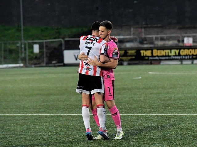 Michael Duffy and Brian Maher celebrate Derry City’s FAI Cup quarter-final win over Shelbourne. Photograph: George Sweeney