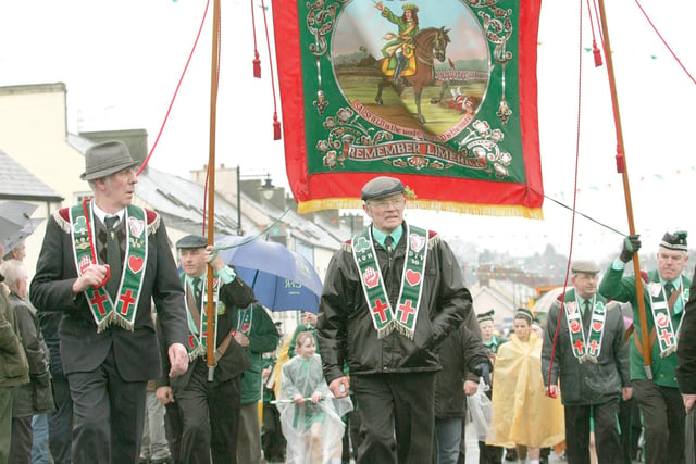 The Ancient Order of Hibernians from Co-Derry marching through Draperstown as they celebrate St Patricks Day at the weekend. LV12-710MML