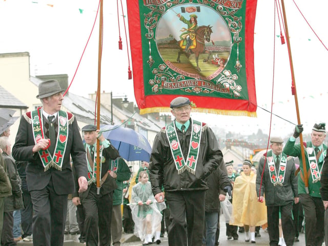 The Ancient Order of Hibernians from Co-Derry marching through Draperstown as they celebrate St Patricks Day at the weekend. LV12-710MML