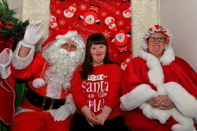 Niamh pictured with Santa and one of his helpers at the Christmas Wonderland at Destined, organised by the Western Trust Children’s Disability Team and the Destined Team. Photo: George Sweeney