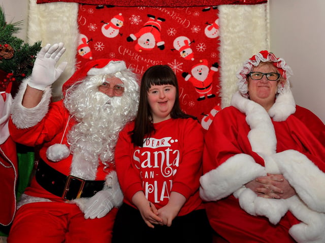 Niamh pictured with Santa and one of his helpers at the Christmas Wonderland at Destined, organised by the Western Trust Children’s Disability Team and the Destined Team. Photo: George Sweeney