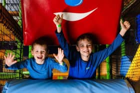 Young boys cheering for free soft play days at High Rise Lisburn