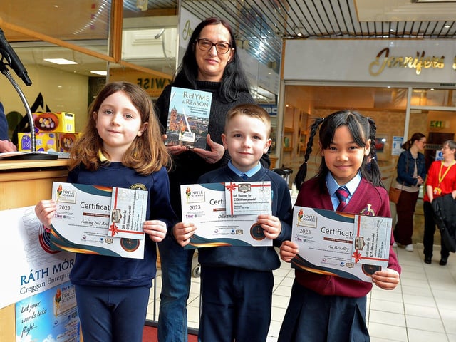 Joint Third Place in the KS1 My Dream category in the inaugural Foyle Schools Poetry Competition were Aisling Nic Aodha, Gaelscoil Éadain Mhóir, Ollie Shiels, Hollybush PS and Via Bradley, St Eithne’s PS, pictured with sponsor Jenni Doherty from Little Acorns Bookstore. Photo: George Sweeney. DER2313GS – 33