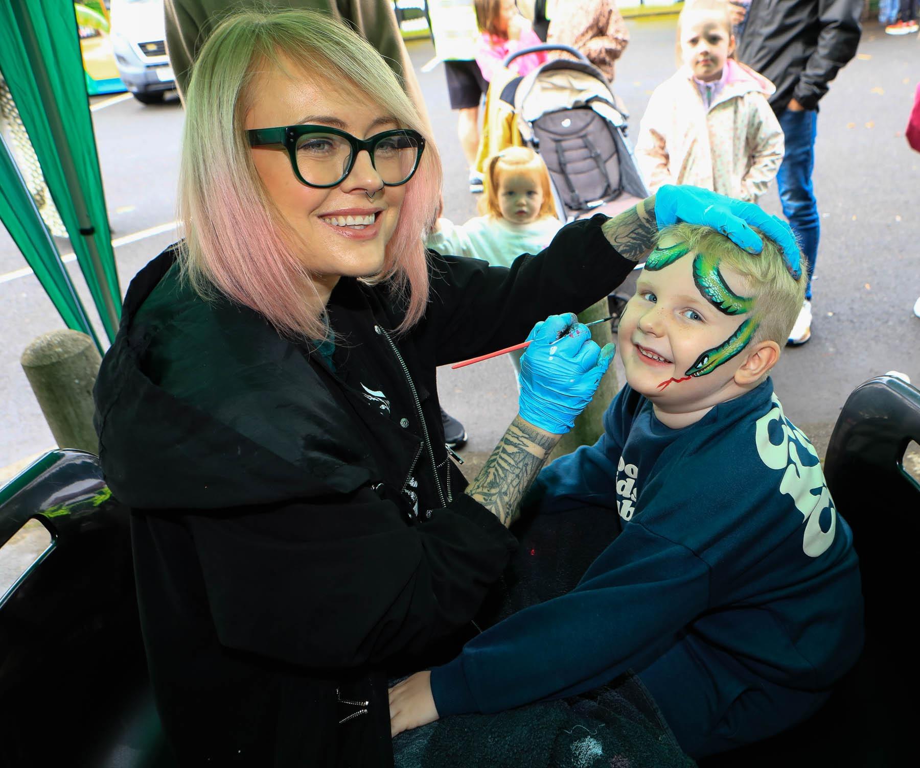 Pearse Deery has his face painted by Anna at the St Brigid’s Heart of Community Festival on Saturday. (Photo - Tom Heaney, nwpresspics)