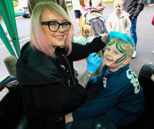 Pearse Deery has his face painted by Anna at the St Brigid’s Heart of Community Festival on Saturday. (Photo - Tom Heaney, nwpresspics)