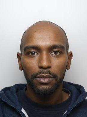 Detectives investigating the murder of 21-year-old Kavan Brissett in Sheffield are for help to find Ahmed Farrah, who is also known as Reggie.
Kavan was stabbed to death in Upperthorpe in 2018.
Wanted man Farrah is believed to have been injured in the same incident.
You can also speak to Crimestoppers on 0800 555111. Please quote incident number 827 of 14 August 2018 when passing on information.