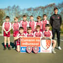 St Canice's, Feeney double winners with Derry All Star forward Shane McGuigan. (Photo: Ryan Crockett)