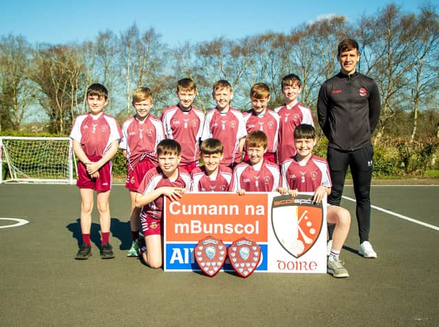 St Canice's, Feeney double winners with Derry All Star forward Shane McGuigan. (Photo: Ryan Crockett)