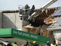 Firefighters respond to the catastrophic explosion in Creeslough.