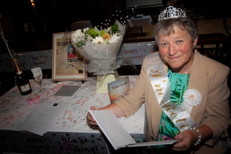 Ms. Linda Heaney reading some of the well wishes during her retirement function at Da Vinci's last week. 