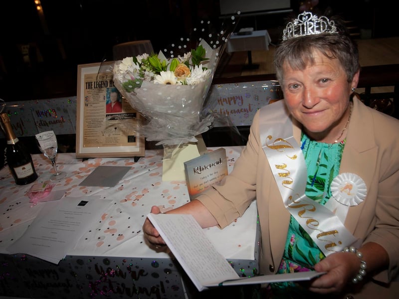 Ms. Linda Heaney reading some of the well wishes during her retirement function at Da Vinci's last week.