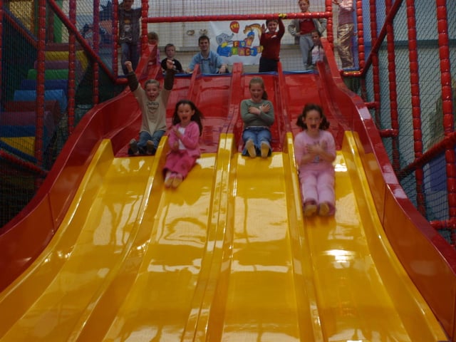 Joanne McLaughlin, Megan O'Connor, Seanan Gormley, Shannon Moore enjoying the slide
