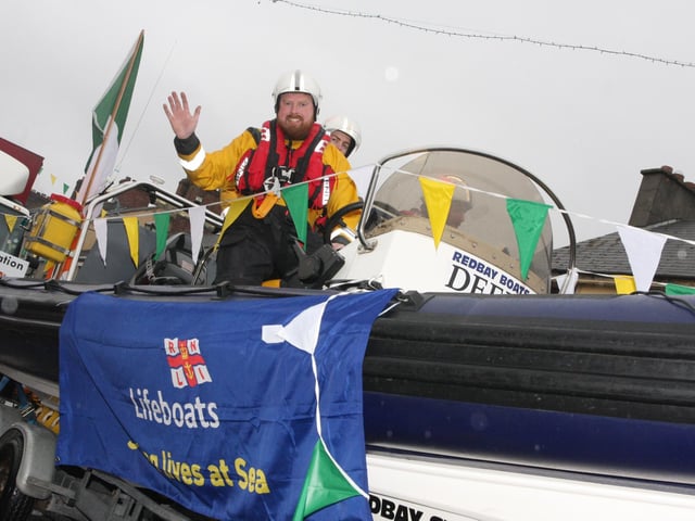 The RNLI float makes its way down Main Street, Buncrana on Sunday. 1903JM26