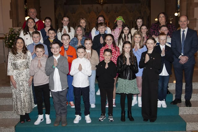 Pupils from Rosemount PS who received the Sacrament of Confirmation from Fr. Paul Farren at St. Eugene’s Cathedral on Friday last. Included is Mr. Paul Bradley, Principal, Mrs. Meenan, teacher, Ms. Begley and Mrs. McGuinness. (Photo: Jim McCafferty Photography)
