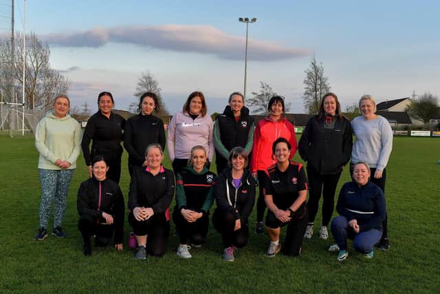 Some of the participants who took part in Doire Trasna’s  first Mothers and Others football practice session, at Corrody Road. Photo: George Sweeney.  DER2316GS – 06